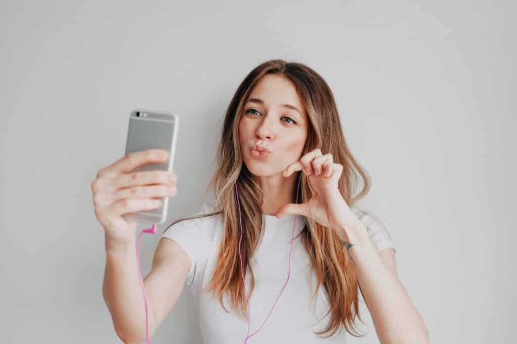 Young girl with mobile phone are making social media content, online calling, Instagram content